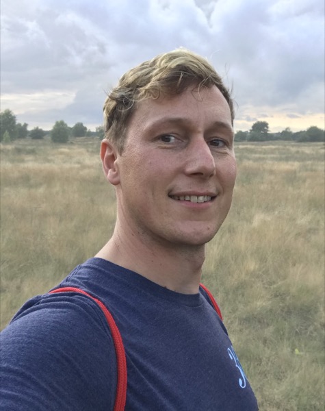 Bas Brands smiling, outdoors on a heath
